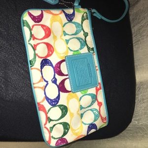 Coach poppy colored wristlet price firm